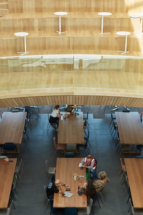 Looking down from the atrium, provides a view of the market-place-like lobby, café and mini-supermarket.