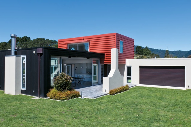 The freight container second floor creates a bright pointer to the entry.