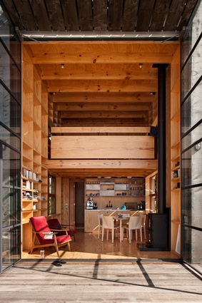 According to the architect: "The hut is a series of simple design moves. The form is reminiscent of a surf lifesaving or observation tower."