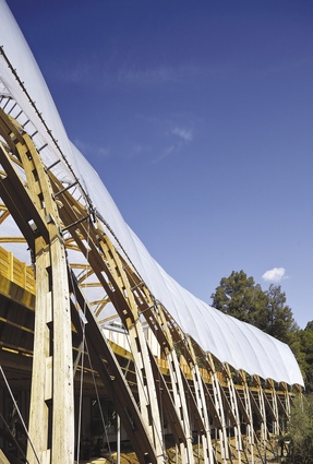 Tethering of the roof material on the west side.