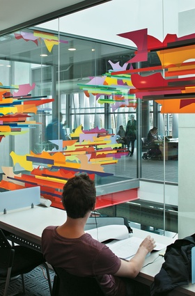 Colourful artworks liven up the interior study areas.